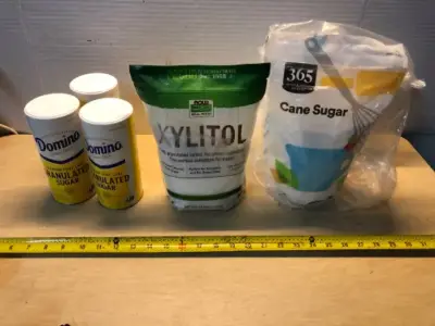 3 cans Domino Sugar exp:11/03/2028, Xylitol sugar (opened) exp: 09/2030, 365 Cane Sugar (opened) exp:10/02/2028