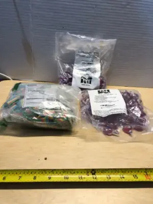 Bag of sour belts ( opened), 2 bags (opened) sugar free cinnamon candies exp:12/30/2026