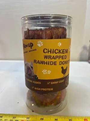 two chicken wrapped rawhide donuts