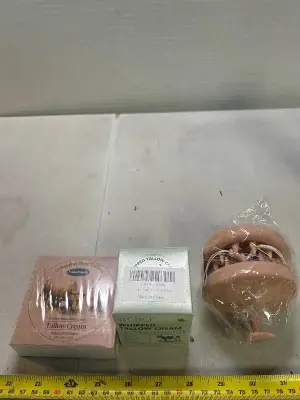 2 hair washing brushes and 2 tallow creams