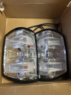 2 taillights to unknown vehicle