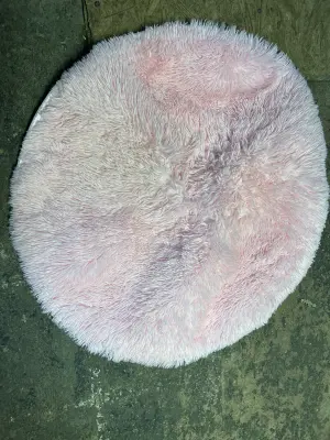 small pink fluffy circle rug