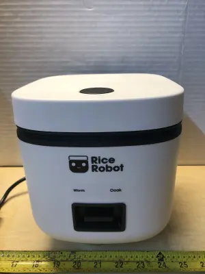 Rice robot rice cooker comes on