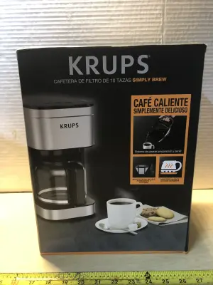Krups coffee pot comes on
