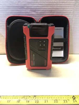 Jump starter with air compressor in case comes on