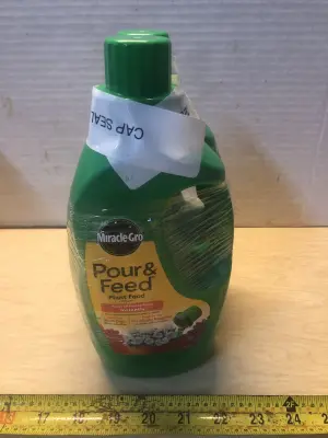 2 bottles 32oz Miracle gro plant food