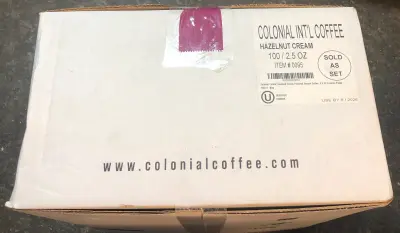 100 packs 2.5oz colonial int’l coffee hazelnut cream