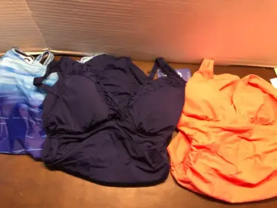 3 women’s size small bathing suits