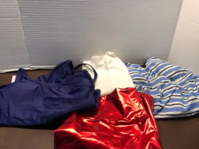 2 medium swimsuits a top a skirt