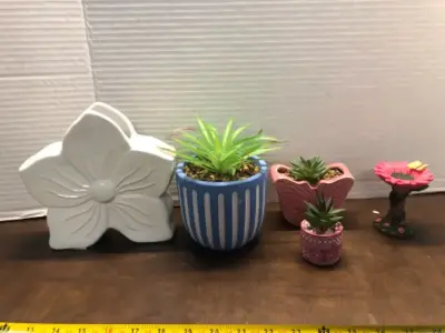 Vase, 3 faux plants , garden statue