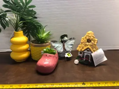 3 faux plants and decorations