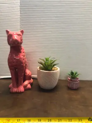 Statue and 2 faux plants