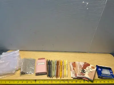 Crystal fan , affirmation pens/notebooks, ear plugs and gift bags