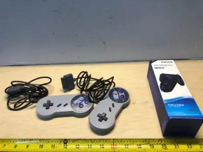 PS4 dual charging dock and Nintendo controllers (2)