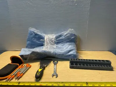 spring-loaded center punch set, disposable cloths, putty knife , wrench and socket organizer