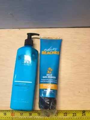 Body moisturizer and tanning lotion (slightly damaged bottle)