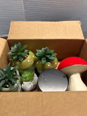 faux plant decor and candle