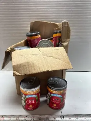 Box of various in date wet dog foods