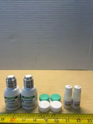 Multipurpose disinfecting solution (2), contact lens holder (2) and systane lubricant eye drops (2)