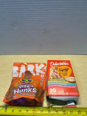 Delectables cat squeeze treats(10/28/26) and vegetarian dog treats(09/10/26)
