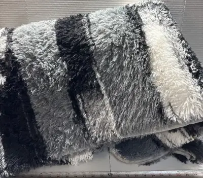 Large area rug (unknown size)