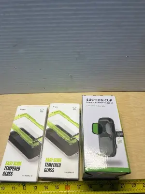 Tempered glass screen protectors (2) and suction cup car phone holder