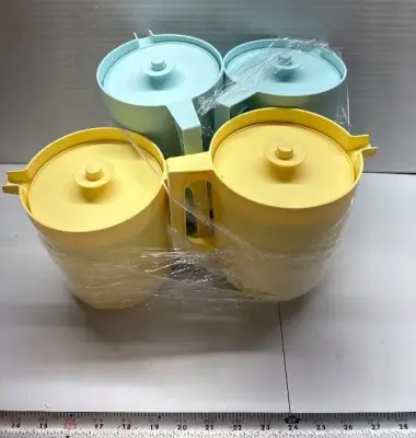 4 Tupperware drink containers