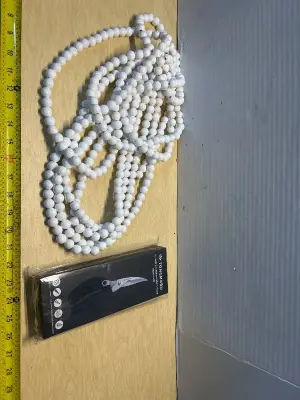 Decorative beads and garden shears