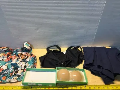 Skirt (XL),bathing suit tops (2)(S)(L) and nipple covers (4)