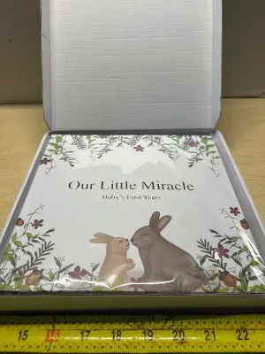 Babys first miracle scrap book