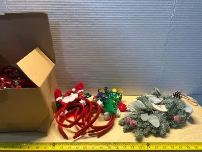 Box of decorative headbands and Christmas decoration