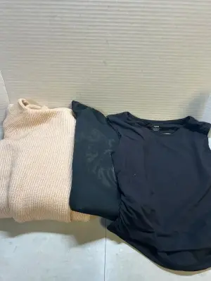 size large workout shorts and large turtle neck sweater