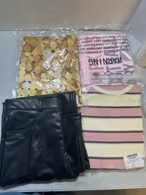 size small button up , 2 tshirts and 1 faux leather pants