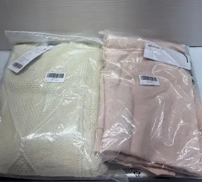 Size M sweater and size L cardigan