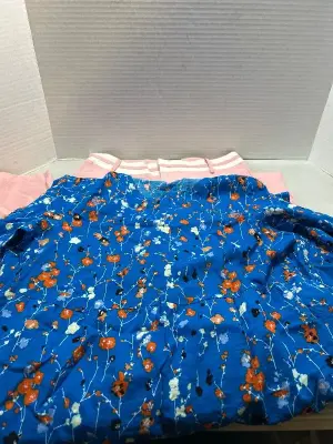 size small dress and medium sized pink pants