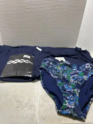 2 xs skirts bathing suit bottoms and  fishnets