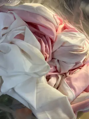 unknown size pink and white tablecloths