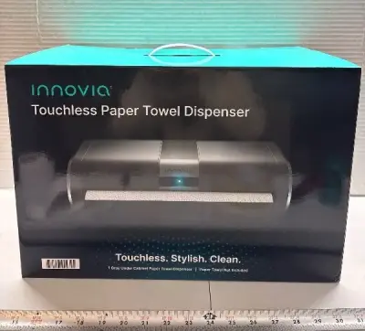 Touchless paper towel dispenser