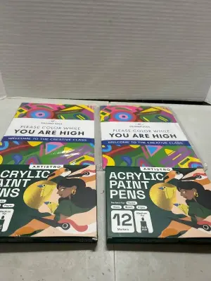 2 adult coloring books and set of 12 paint pens