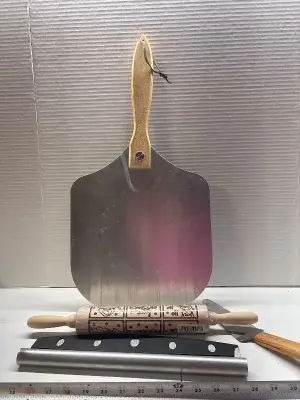 Pizza pan, pizza cutter and rolling pin