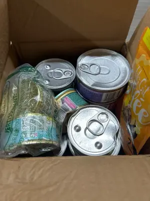 box of assorted cat food