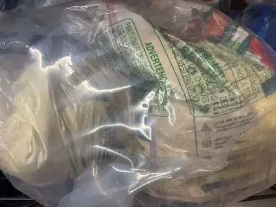 2 bags of multi grain litter (bags has rip but completely sealed in other bag)