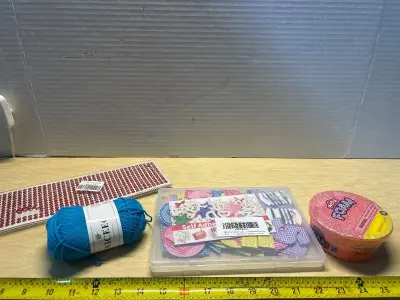 Play doh foam , yarn, stick on jewels and self adhesive letters