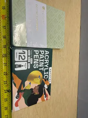 Notebook and acrylic paint pens