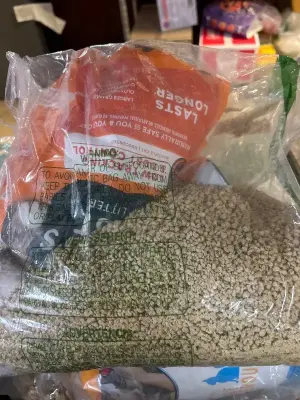 “worlds best” all natural cat litter bag busted