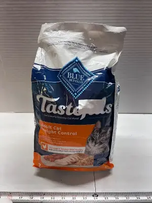 7Lb blue buffalo tasteful weight control exp: 04/27
