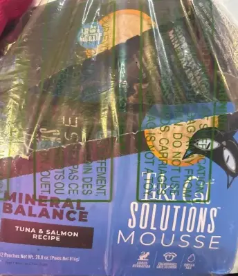 12pk tiki cat food exp:03/27