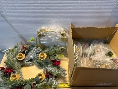 Christmas wreaths (2) and extra candle holder rings (2)