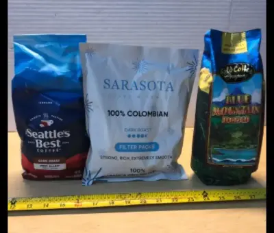 Seattles best dark roast ground coffee exp:12/07/2026, Sarasota 100%Colombian filter packs ground coffee, Blue Mountain blend whole bean coffee exp:01/05/2027