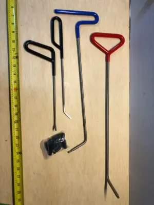 4 Dent removing rods with caps
